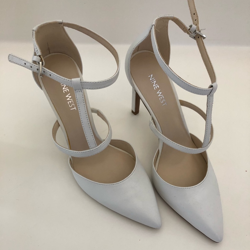 White t strap heels. New. Without tags.